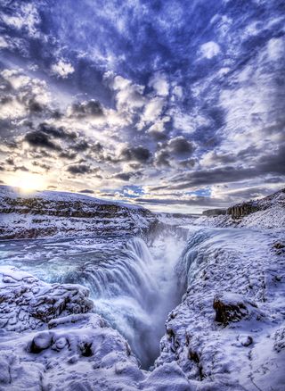 This is Gulfoss, the frozen waterfall in Iceland.