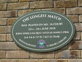 Plaque on Wimbledon Court No. 18 to commemorate the longest match in tennis history between John Isner and Nicolas Mahut on 22-24 June 2010.jpg